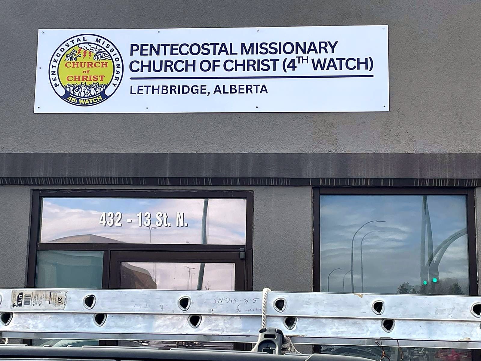 Pentecostal Missionary Church of Christ 4th Watch sign on a Lethbridge building
